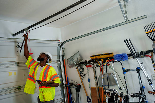Professional Garage Door Spring Repair technician working in Ellport, PA